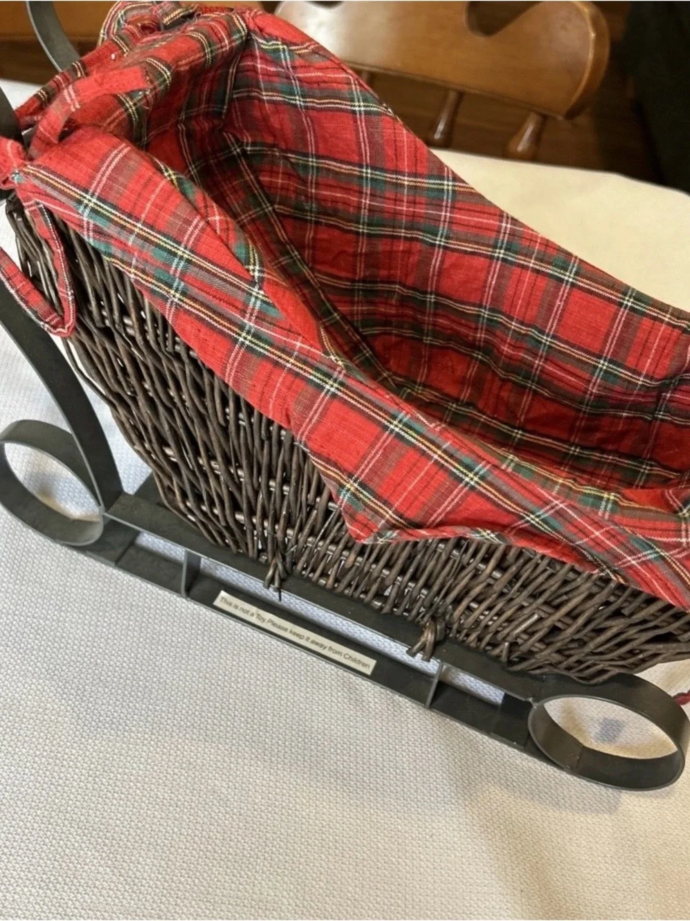 Rustic Wicker Sleigh Basket with Red Plaid Liner Metal Runners